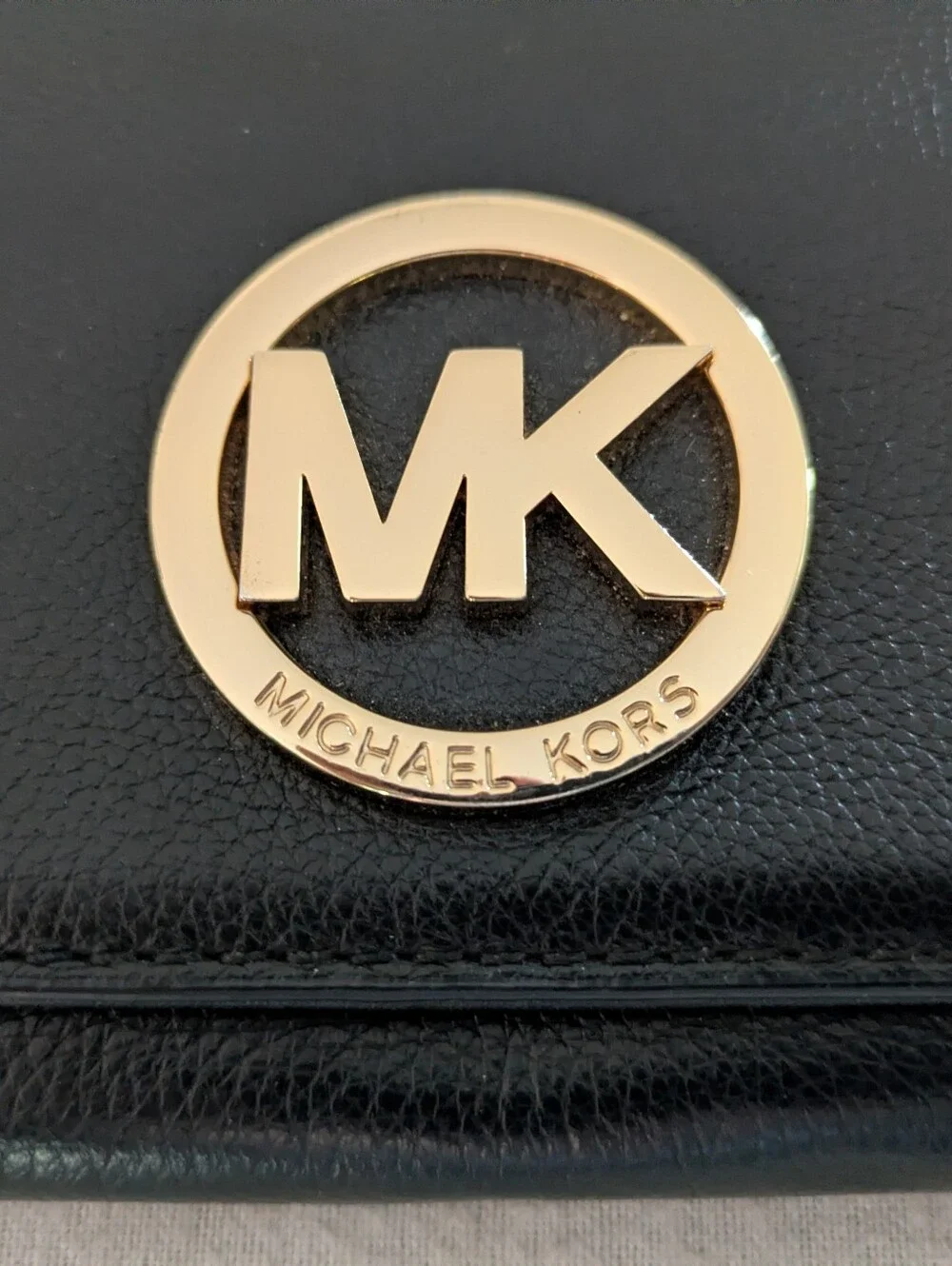 Michael Kors Black Leather Fulton Continental Wallet with Gold MK Emblem